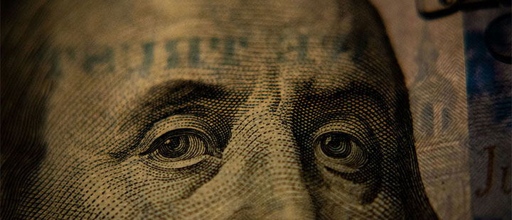 USD headwinds displayed with abstract blue financial cues