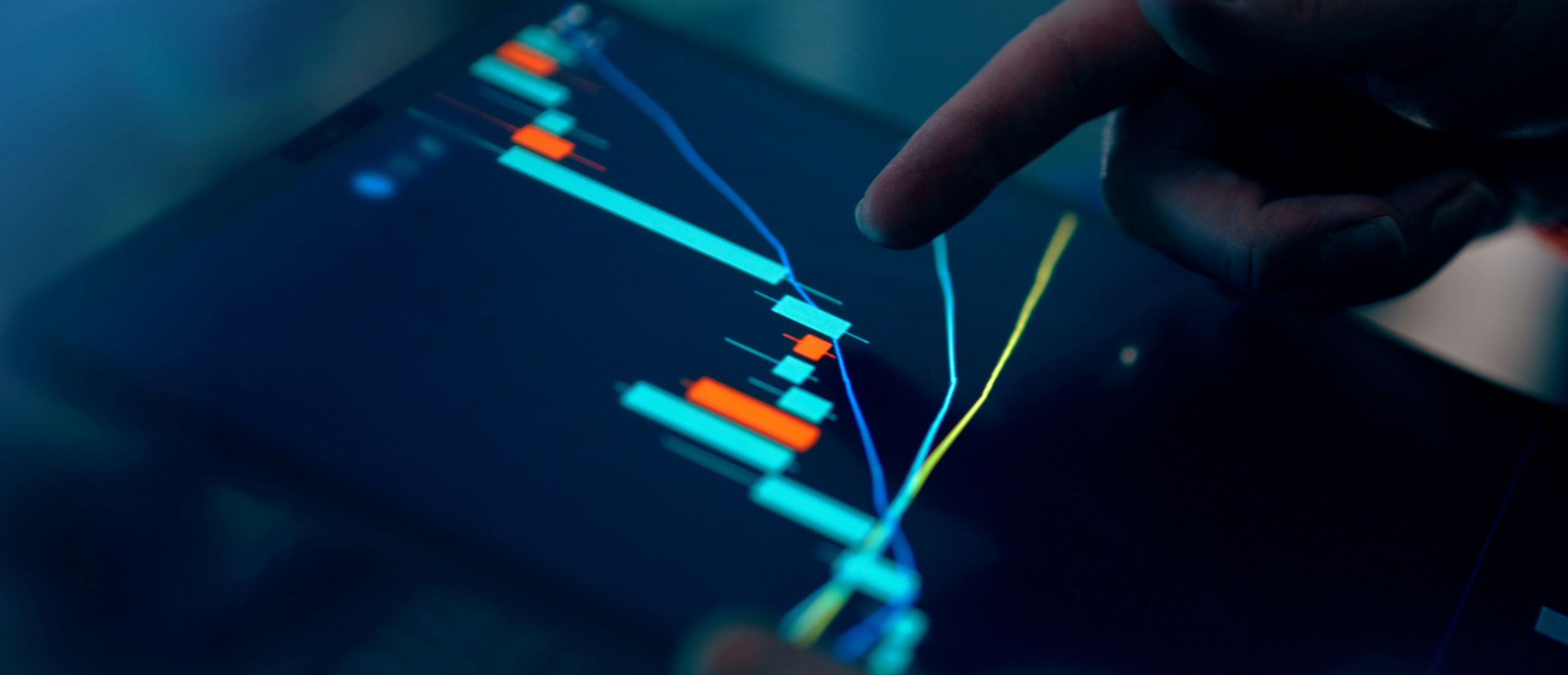 Digital stock market chart with candlestick patterns on a screen