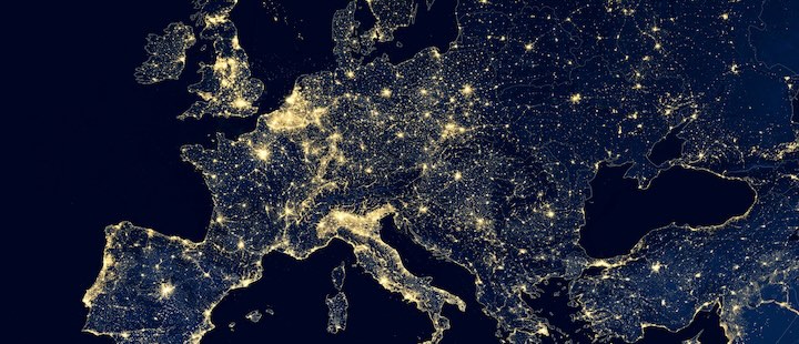 Earth at night, view of city lights showing human activity in Europe from space. EU and Mediterranean on world dark map on global satellite photo.