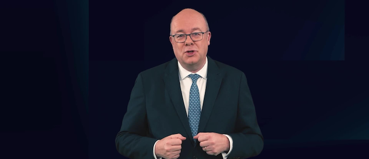 CIO Insights Annual Outlook 2026 horizontal illustration, showing the ocean with a sailor operating a winch on a catamaran on the right and a city skyline on the left