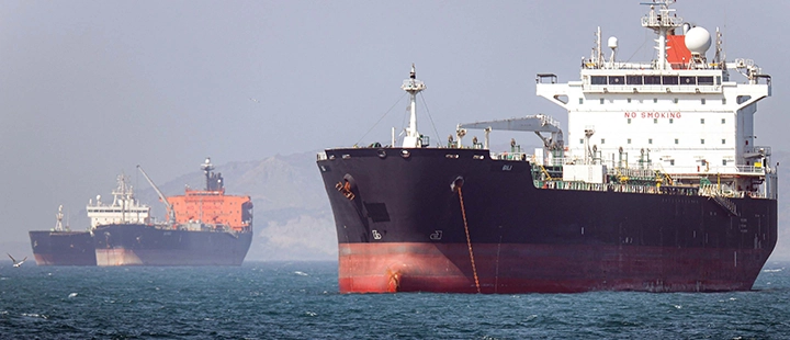Oil tankers at sea amid geopolitical instability and market volatility