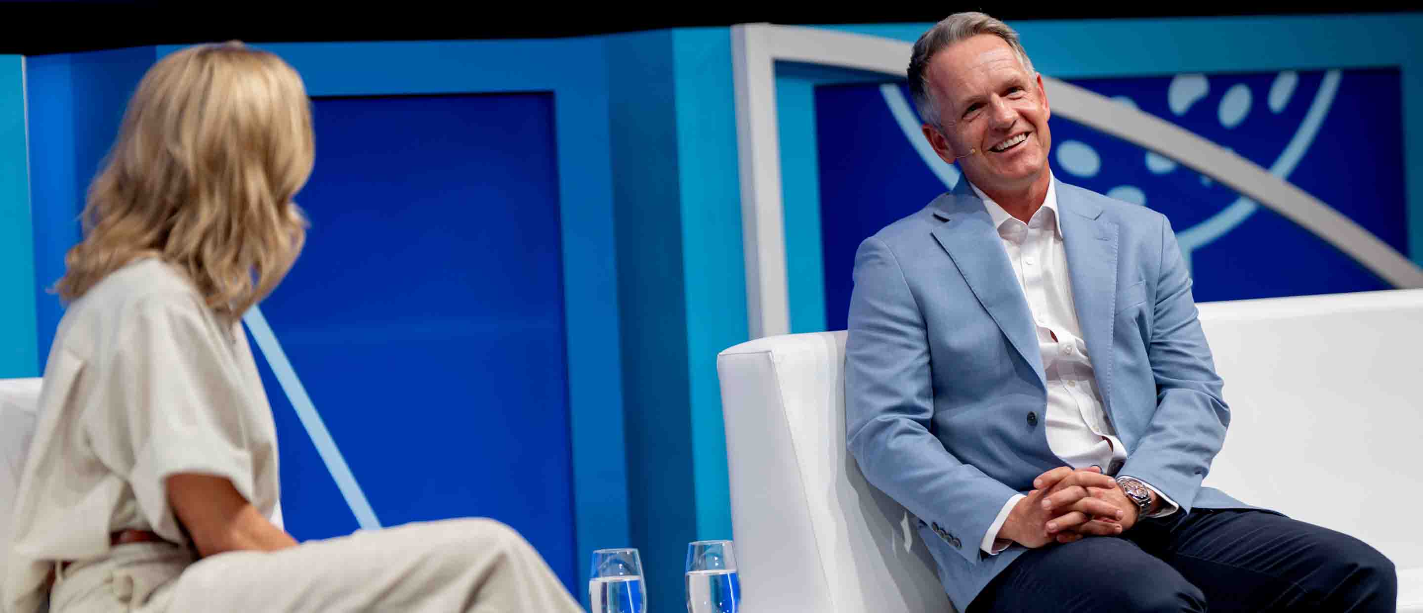 Luke Donald on stage at Deutsche Bank Sports Investment Conference